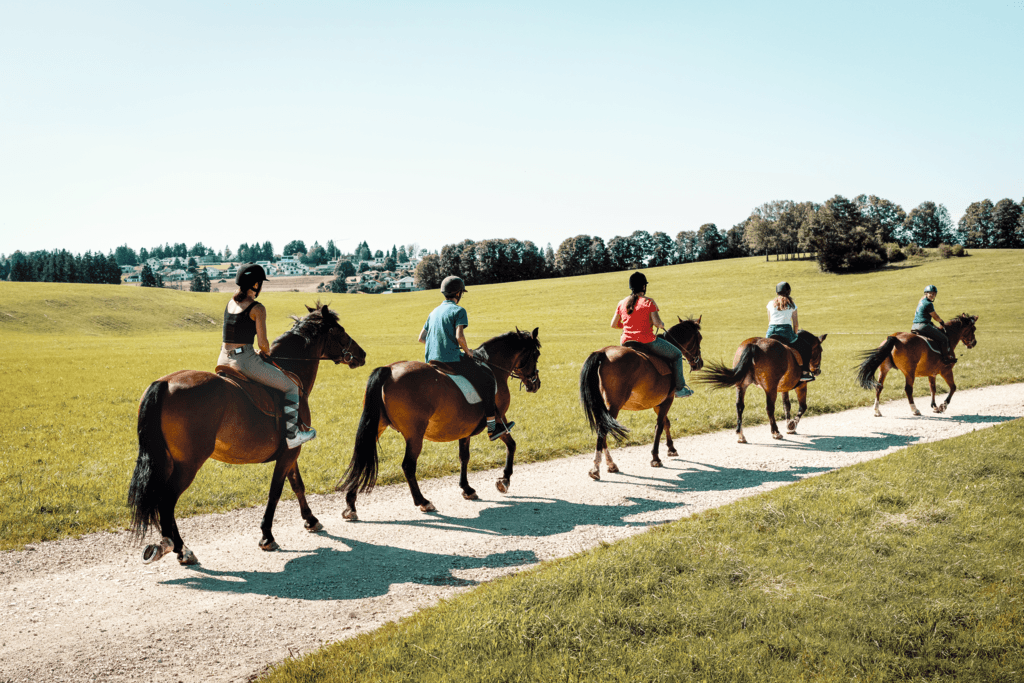 Le Noirmont group with Freiberger on a horseback ride