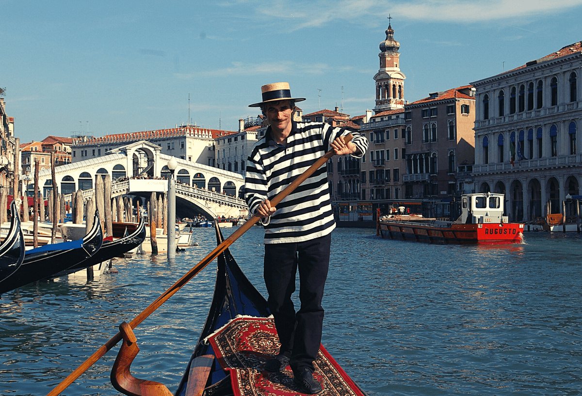 Venice from the deck of a gondola – image 1